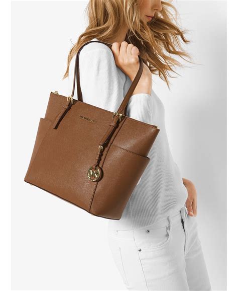 michael kors jet set east west top zip tote peanut|Michael Kors carryall.